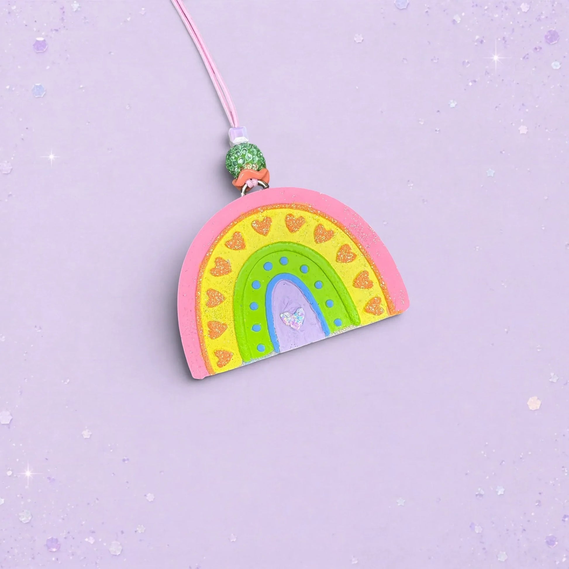 BeFreshie medium rainbow car freshie in vanilla rock candy scent with glittery pink, yellow, green, and purple arches